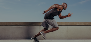 Athlete sprinting along a rooftop track